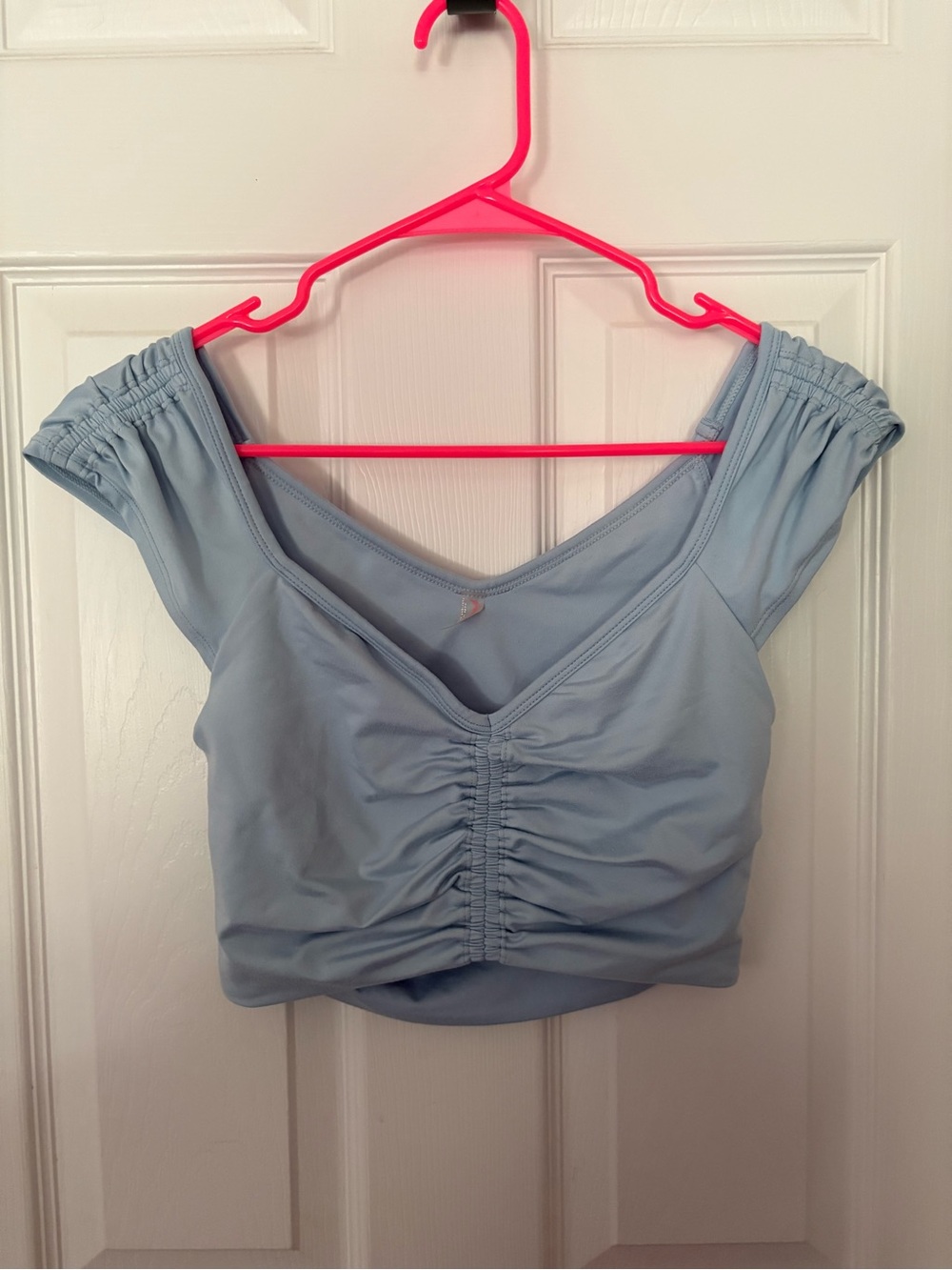 FP Movement by Free People Blue Ruched Crop Top. With cutout in back